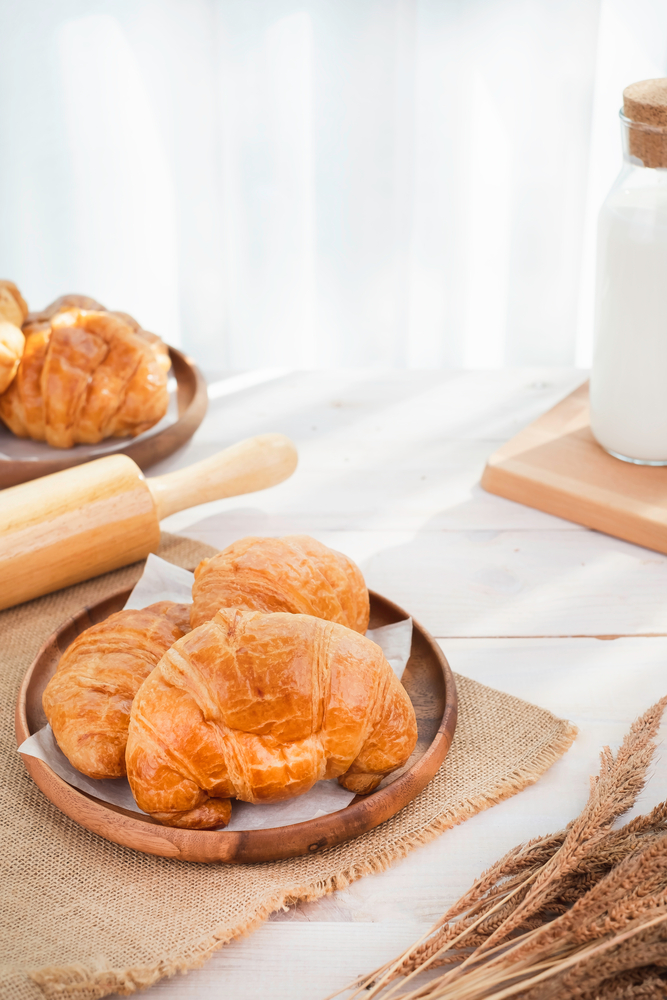 French,Buttered,Croissants,On,White,Wood,Table,Background.,Freshly,Baked